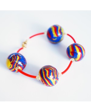 Bracelet rouge, bleu et jaune avec perles faites artisanalement Bracelets