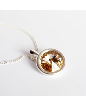 Pendentif beige et rond en cristal de Swarovski avec sa chaîne en argent Pendentifs en perles et cristal