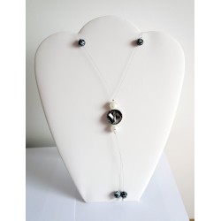 Sautoir noir et blanc en perles en cristal et polaris