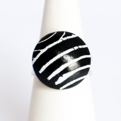 Small black ring with white stripes