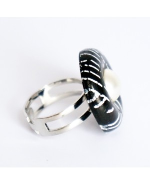 Black ring with white mother-of-pearl cabochon. Quirky and polymer clay rings