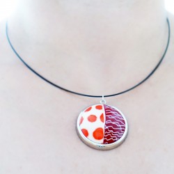 Round pendant with polka dots and scribbles