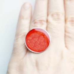 Large red ring with a scale effect