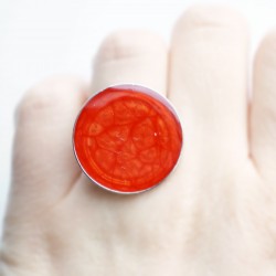 Large red ring with a scale effect