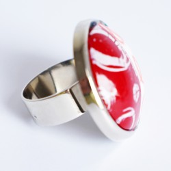 Red and white ring with circles and spirals