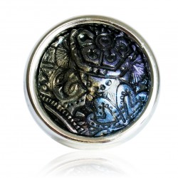 Large black ring with metallic reliefs