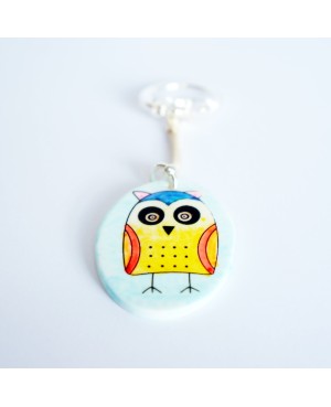 Porte-clé hibou jaune sur fond bleu ciel Porte-clés