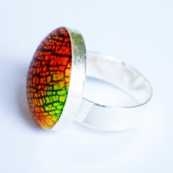 Red, orange and yellow ring with a metal effect
