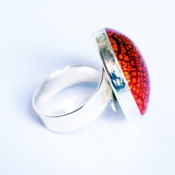Red, orange and yellow ring with a metal effect