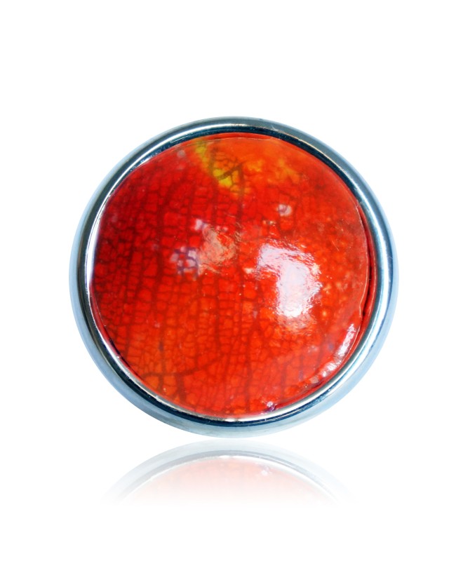 Bague orange craquelée et reflets métalliques