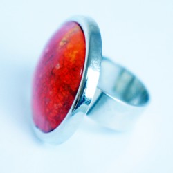 Orange ring with crazed effect and metal reflections