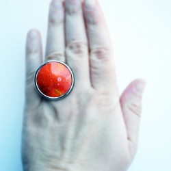 Orange ring with crazed effect and metal reflections