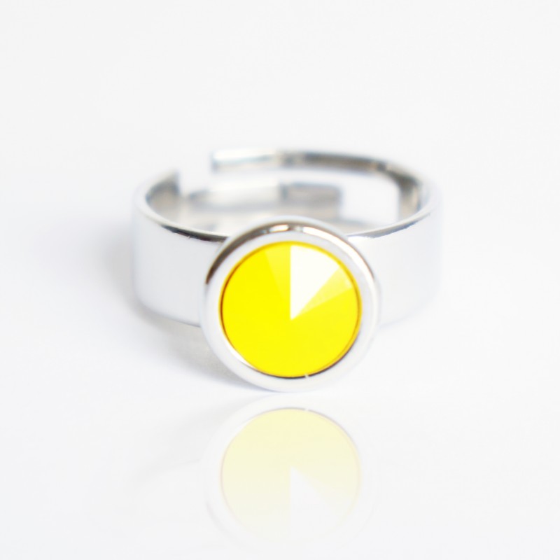 Yellow solitaire ring in crystal