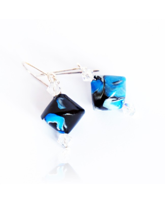 Blue, white, and black earrings