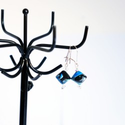 Blue, white, and black earrings