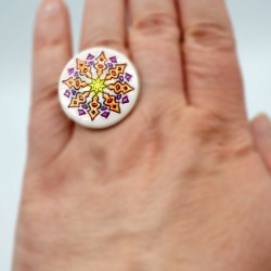 Orange, yellow, purple, and pink mandala ring