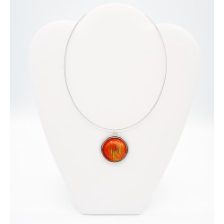 Round choker pendant, orange and yellow.