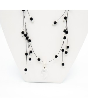 Black and white bead necklace with a crystal leaf pendant Mid-length necklaces