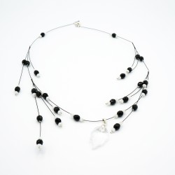 Black and white bead necklace with a crystal leaf pendant