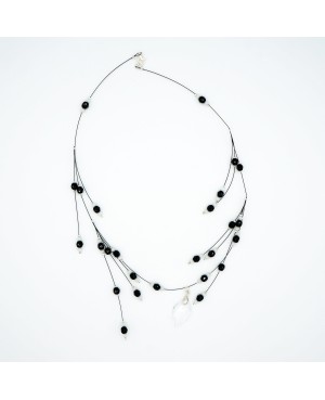 Black and white bead necklace with a crystal leaf pendant Mid-length necklaces