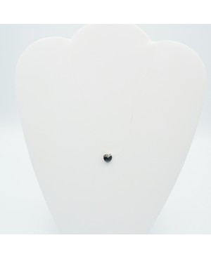 A small black heart pendant with a nylon cord Heart pendants