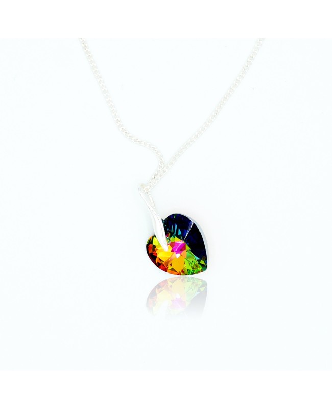 Green heart pendant with multicolored reflections