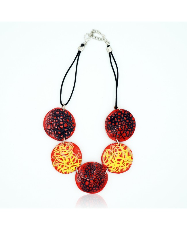 Red necklace with yellow and black scribbles