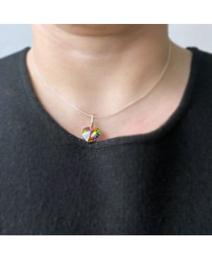 Green heart pendant with multicolored reflections Heart pendants