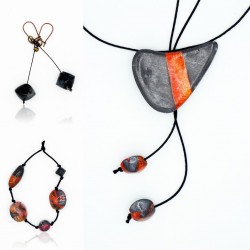 Set of necklace, bracelet, and earrings in black and orange polymer clay