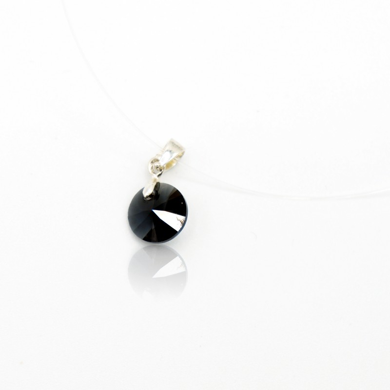Very small discreet pendant, round and black, with its transparent nylon cord