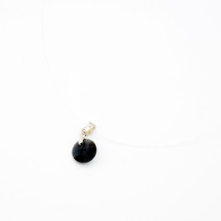 Very small discreet pendant, round and black, with its transparent nylon cord