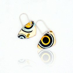 Fancy earrings with multicolored circles.