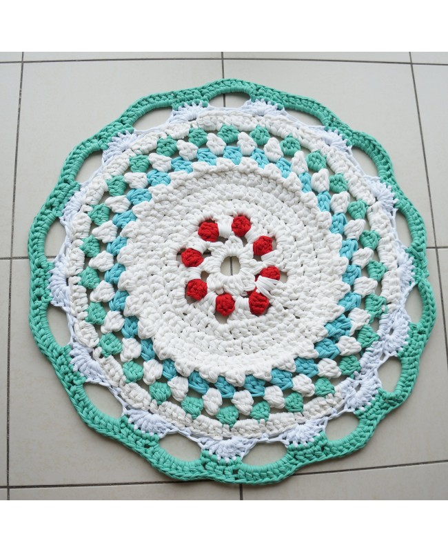 Red, white, and turquoise mandala rug