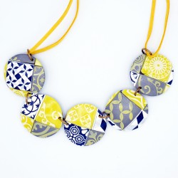 Medium-length necklace in yellow, blue, gray, and white