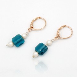 Earrings with green crystal pearls, white pearls, and rose gold settings