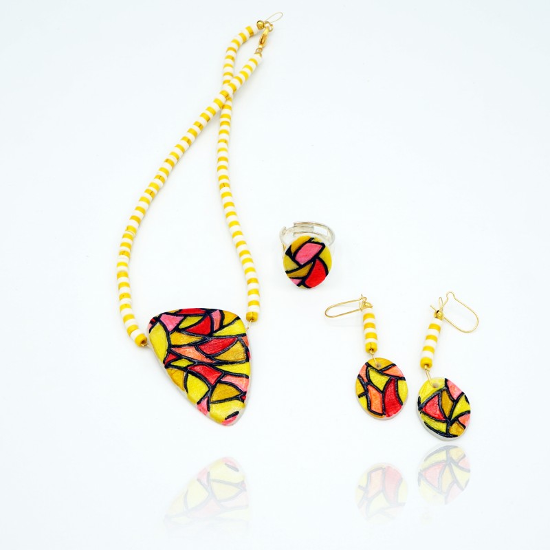 Stained glass jewelry set consisting of a necklace, a ring and earrings.