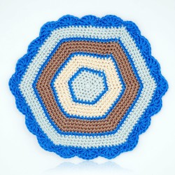 Hexagonal doily in blue, beige, and brown