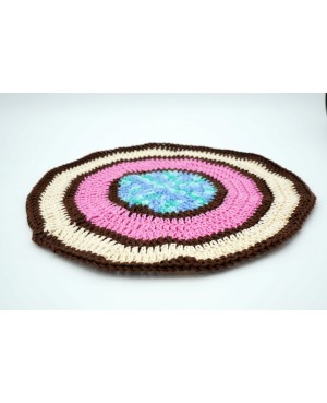 Round doily in brown, beige, pink, and blue. Crochet Doilies