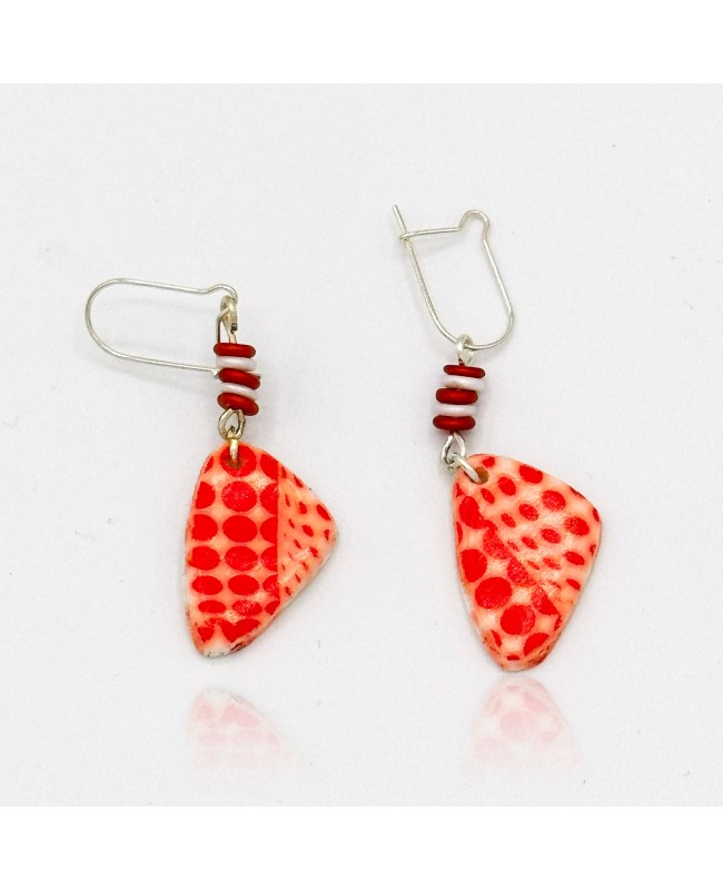 White dangling earrings with red polka dots